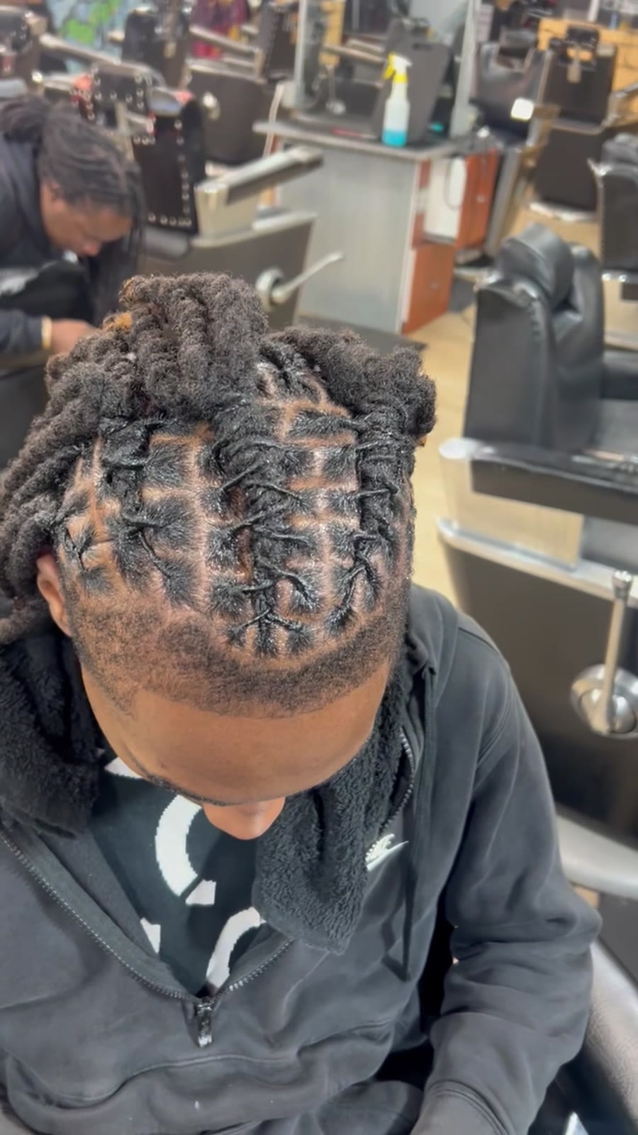 Locs retwisted with clean parts